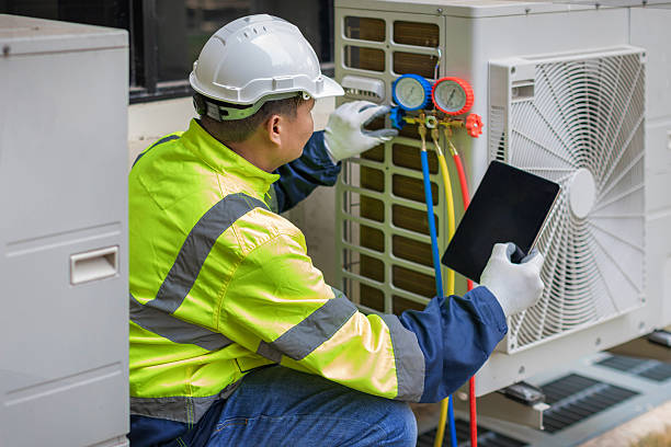Professional Air Conditioning Repair technician working in Tupman, CA